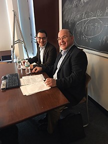 two men at a desk